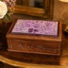 Wooden box for personalized jewellery storage with secret slider-