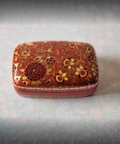 Red floral jewelry box as engagement ring
