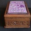 Wooden box for personalized jewellery storage with secret slider-