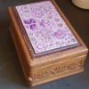 Wooden box for personalized jewellery storage with secret slider-