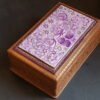 Wooden box for personalized jewellery storage with secret slider-