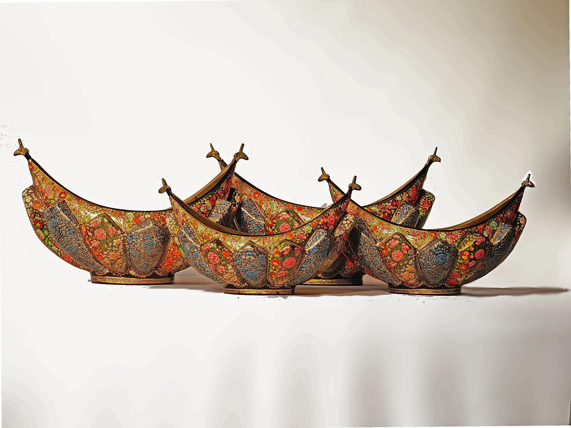 Paper Mache and Brass Fruit Bowls Set Description: Elevate your home or office decor with our stunning set of four Paper Mache and Brass Fruit Bowls