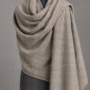 Men's natural grey wool lohi draped on a mannequin