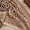 Sozni floral embroidered shawl styled as a flat lay